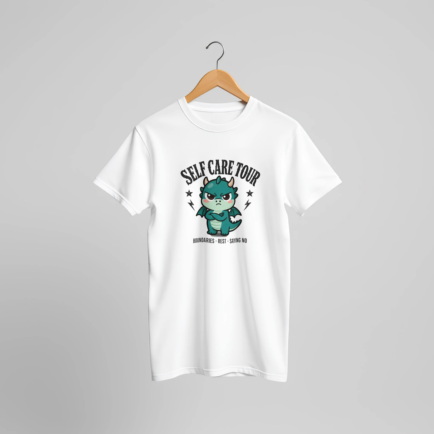 Self Care Tour t-shirt on a hanger showing the regular unisex fit and drape