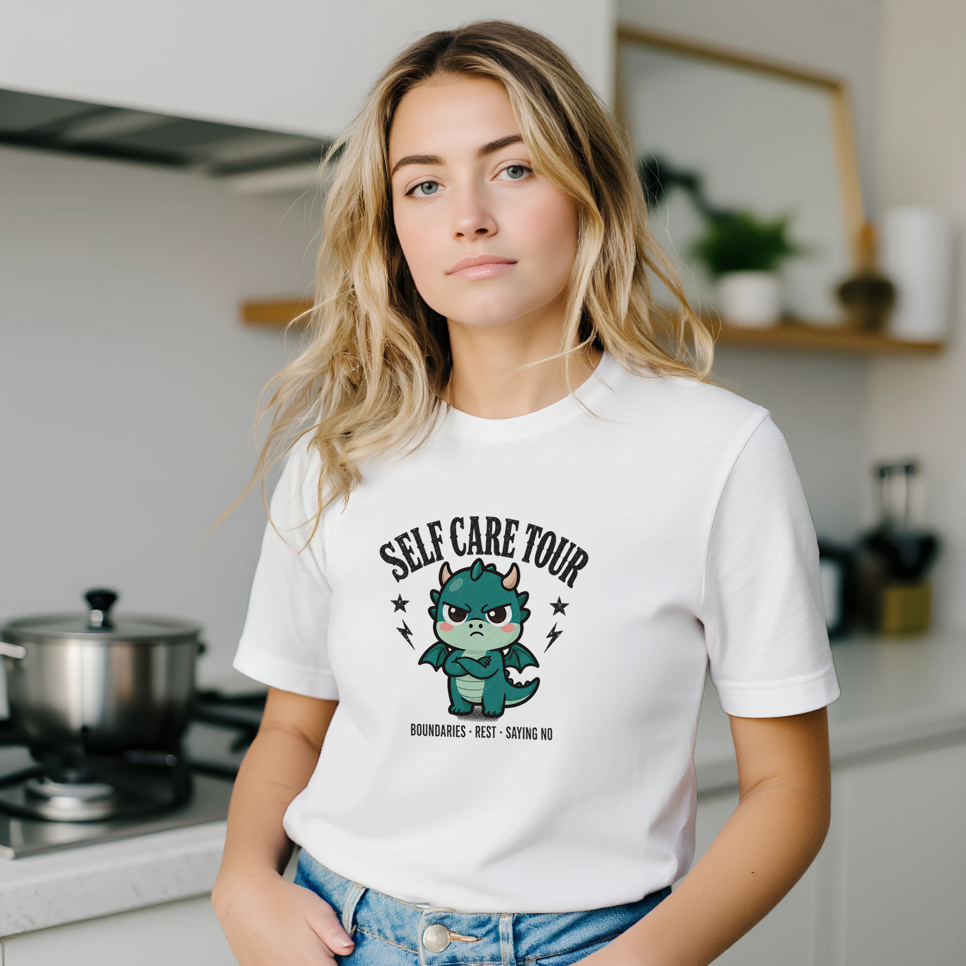 Self Care Tour dragon t-shirt shown in a plain everyday setting